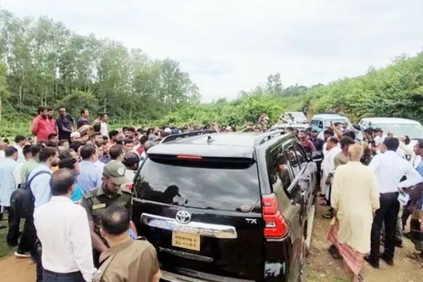 Car On Field People are Gathering