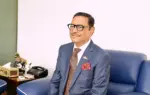 Obaidul Quader Sitting on Sofa