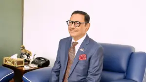 Obaidul Quader Sitting on Sofa