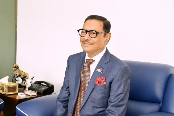 Obaidul Quader Sitting on Sofa