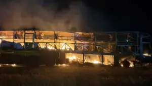 মোটরসাইকেলের সঙ্গে সংঘর্ষের পর একটি যাত্রীবাহী বাসে আগুন ধরে যায়।