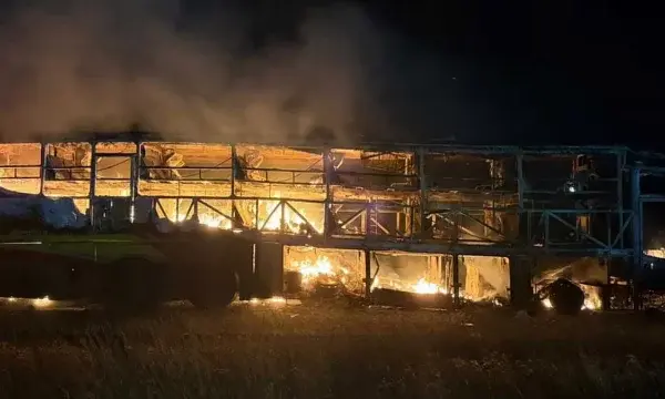 মোটরসাইকেলের সঙ্গে সংঘর্ষের পর একটি যাত্রীবাহী বাসে আগুন ধরে যায়।