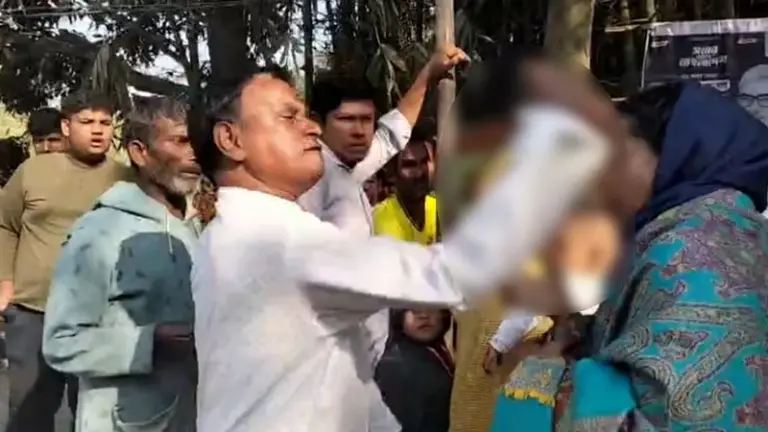 স্বতন্ত্র প্রার্থী হাবিবা বেগমকে থাপ্পড় দেন রজব আলী।