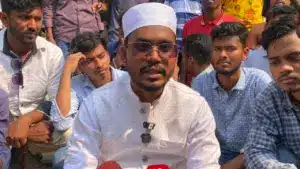 সংঘর্ষের একপর্যায়ে কথা বলছেন এমপি হান্নান মাসউদ।